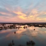 Flood flows at sunset on the San Joaquin River